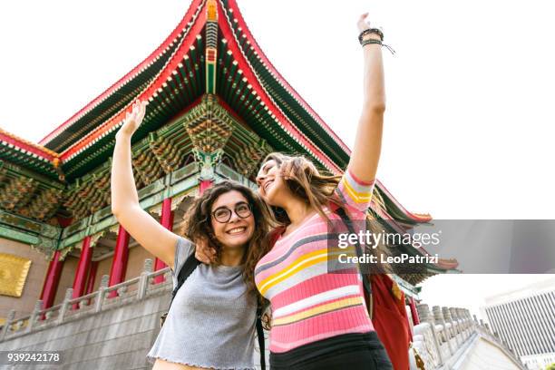 friends traveling abroad to asia in taiwan - taipei - taipei stock pictures, royalty-free photos & images