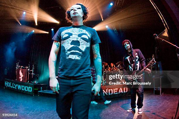 Da Kurlzz and J-Dog of Hollywood Undead perform on stage at Shepherds Bush Empire on December 4, 2009 in London, England.