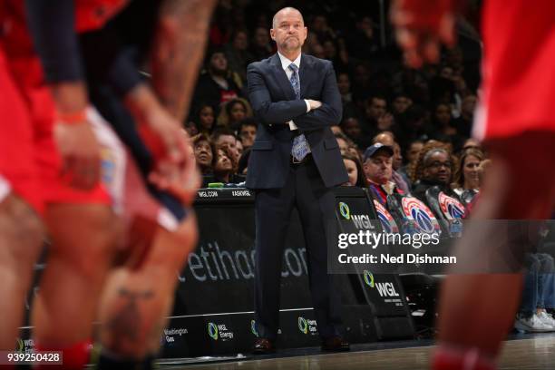 Head Coach Michael Malone of the Denver Nuggets looks on during the game against the Washington Wizards on March 23, 2018 at Capital One Arena in...