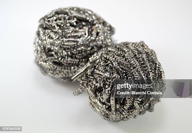 metal scourer for clean on white background - scouring pad stock pictures, royalty-free photos & images