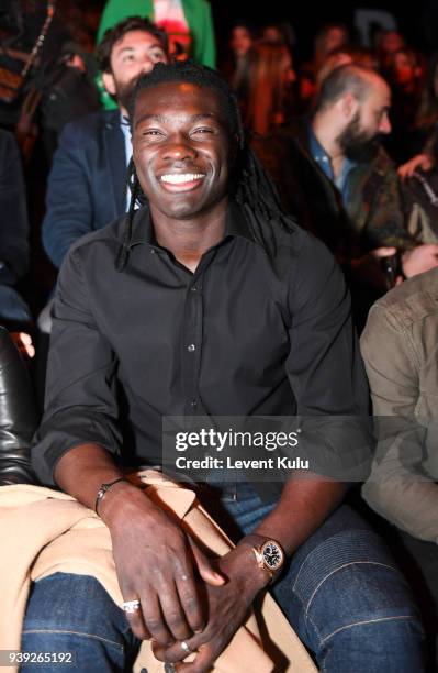 Bafetimbi Gomis attends the St. Nian show during Mercedes Benz Fashion Week Istanbul at Zorlu Performance Hall on March 28, 2018 in Istanbul, Turkey.