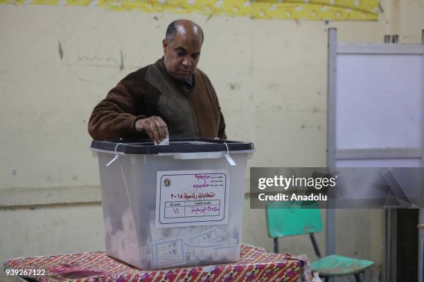 Voter casts his vote at Umm El Moameneen Secondary School on the third and last day of the 2018 Egyptian presidential elections in Beni Suef, Egypt,...