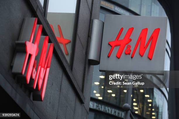 The logo of Swedish clothing retailer H&M hangs over one of its stores on March 28, 2018 in Berlin, Germany. H&M, which is the world's second largest...