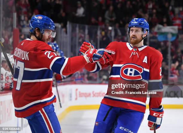 Alex Galchenyuk of the Montreal Canadiens celebrates after scoring a goal against the Washington Capitals in the NHL game at the Bell Centre on March...