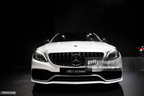 The 2019 Mercedes-Benz AMG C63 sedan is displayed during the Mercedes-Benz media event at the New York International Auto Show, March 28, 2018 at the...