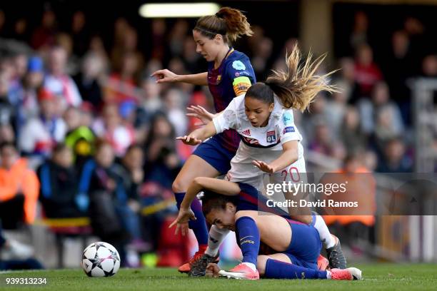 Melanie Serrano of FC Barcelona is challenged by Delphine Cascarino of Olympique Lyon during the UEFA Women's Champions League Quarter Final 2nd Leg...