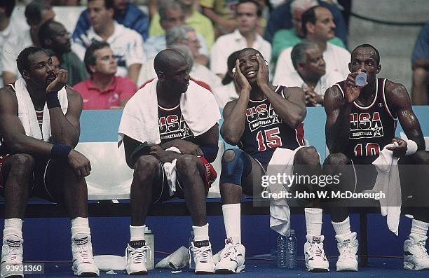 Summer Olympics: View of USA Karl Malone, Michael Jordan, Magic Johnson and Clyde Drexler during game vs Puerto Rico. Dream Team. Badalona, Spain...