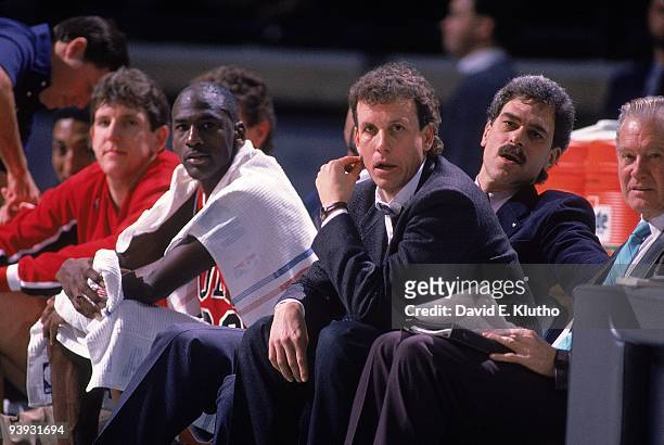 Chicago Bulls Michael Jordan and head coach Doug Collins on sidelines with assistant coach Phil Jackson during game vs Charlotte Hornets. Charlotte,...