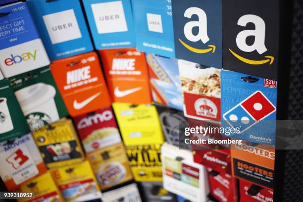 Amazon.com Inc. Gift cards are displayed for sale inside a GameStop Corp. Store in Louisville, Kentucky, U.S., on Thursday, March 15, 2018. GameStop...