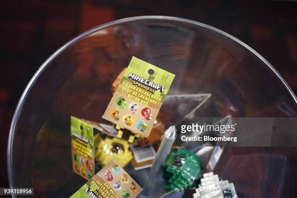 Microsoft Corp. Minecraft toys are displayed for sale inside a GameStop Corp. Store in Louisville, Kentucky, U.S., on Thursday, March 15, 2018....