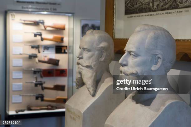 In the weapons museum of Oberndorf - the busts of Wilhelm Mauser and Paul von Mauser, German weapons designers and manufacturers. In the background...