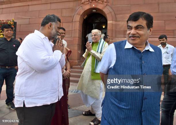 Leaders Murli Manohar Joshi and Nitin Gadkari along with Pappu Yadav during the budget session, at Parliament House on March 28, 2018 in New Delhi,...