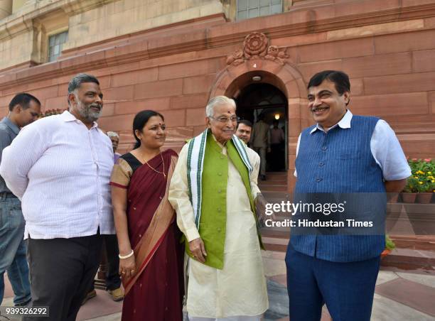 Leaders Murli Manohar Joshi and Nitin Gadkari along with Pappu Yadav during the budget session, at Parliament House on March 28, 2018 in New Delhi,...