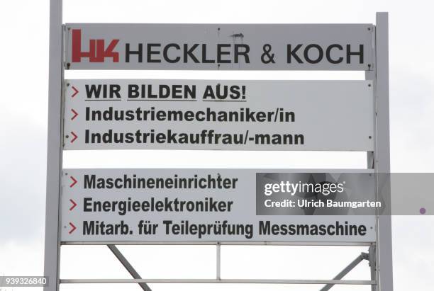 Exterior view of the headquarters of the weapons manufacturer Heckler & Koch in Oberndorf - advertising sign for training at Heckler & Koch.