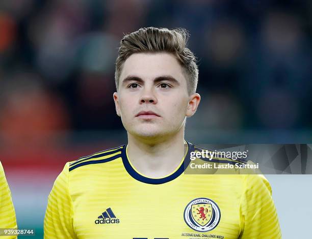James Forrest of Scotland listens to the anthem during the International Friendly match between Hungary and Scotland at Groupama Arena on March 27,...