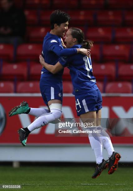 Francesca Kirby of Chelsea is congratulated by team-mate So-Yun Ji after scoring during the UEFA Womens Champions League Quarter-Final second leg...