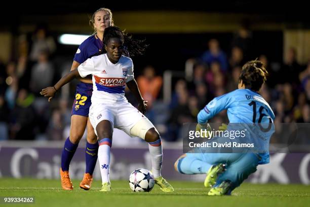 Griedge M'Bock Bathy of Olympique Lyon is challenged by Lieke Martens of FC Barcelona during the UEFA Women's Champions League Quarter Final 2nd Leg...