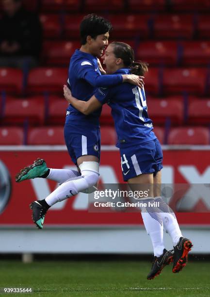 Francesca Kirby of Chelsea is congratulated by team-mate So-Yun Ji after scoring during the UEFA Womens Champions League Quarter-Final second leg...