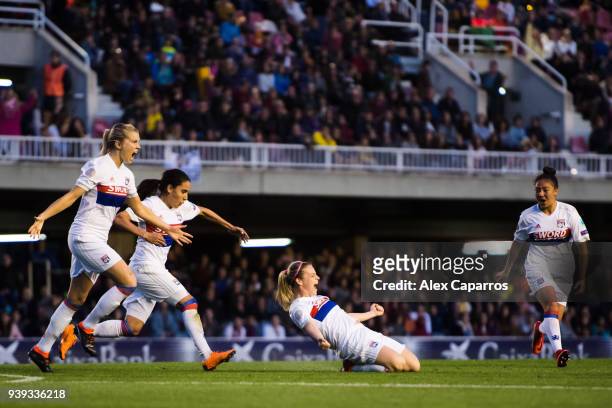 Eugenie Le Sommer of Olympique Lyon celebrates with her teammates after scoring the opening goal during the UEFA Women's Champions League Quarter...