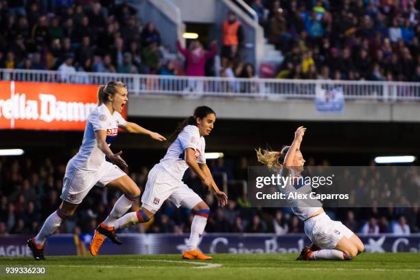 Eugenie Le Sommer of Olympique Lyon celebrates with her teammates after scoring the opening goal during the UEFA Women's Champions League Quarter...