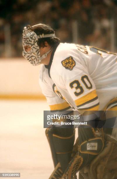Goalie Gerry Cheevers of the Boston Bruins defends the net during an NHL game circa 1980 at the Boston Garden in Boston, Massachusetts.