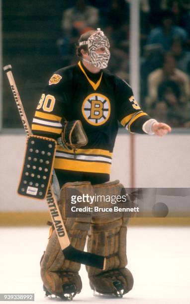 Goalie Gerry Cheevers of the Boston Bruins skates on the ice during an NHL game against the New York Islanders on March 8, 1980 at the Nassau...