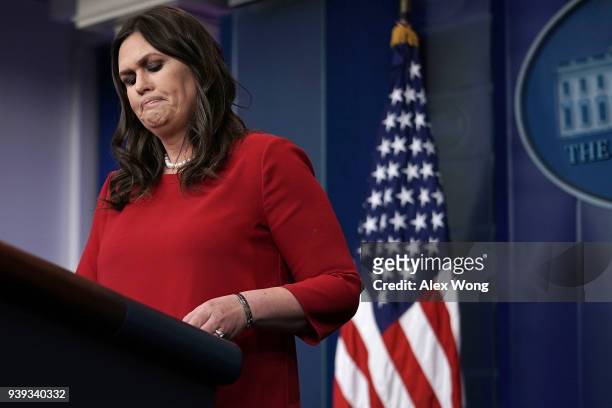 White House Press Secretary Sarah Huckabee Sanders pauses during a White House daily news briefing at the James Brady Press Briefing Room of the...