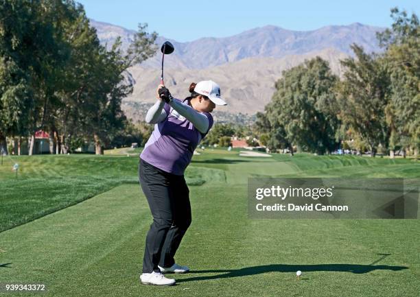 Shanshan Feng of China plays a shot from the third tee during the pro-am as a preview for the 2018 ANA Inspiration on the Dinah Shore Tournament...