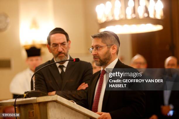 Chief Rabbi of France Haïm Korsia addresses the congregation at The Synagogue des Tournelles in Paris on March 28 during a service in memory of...