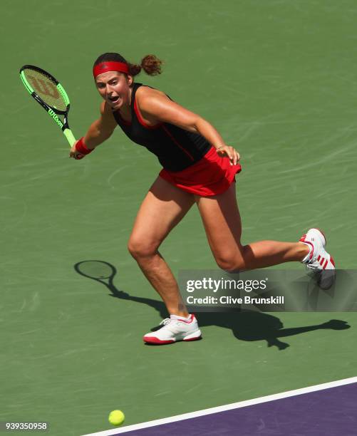 Jelena Ostapenko of Latvia runs to play a forehand against Elina Svitolina of Ukraine in their quarter final during the Miami Open Presented by Itau...