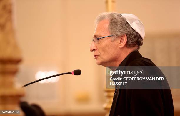 Daniel Knoll, the son of slain Jewish woman Mireille Knoll, speaks in The Synagogue des Tournelles in Paris on March 28 during a service in memory of...