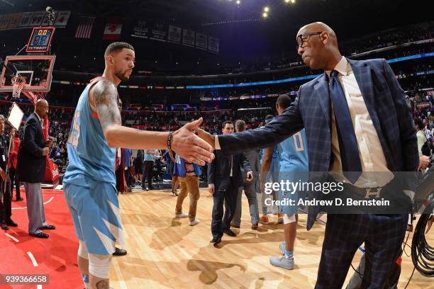 Austin Rivers of the LA Clippers and Assistant Coach Sam Cassell shake hands after the game against the Milwaukee Bucks on March 27, 2018 at STAPLES...