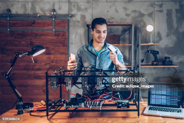 programmer preparing mining rig with gpu - web programmer stock pictures, royalty-free photos & images