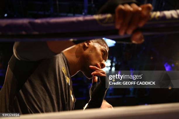 Britain's Anthony Joshua attends a pre-fight public work out press conference at St David's Hall in Cardiff, south Wales on March 28, 2018 ahead of...