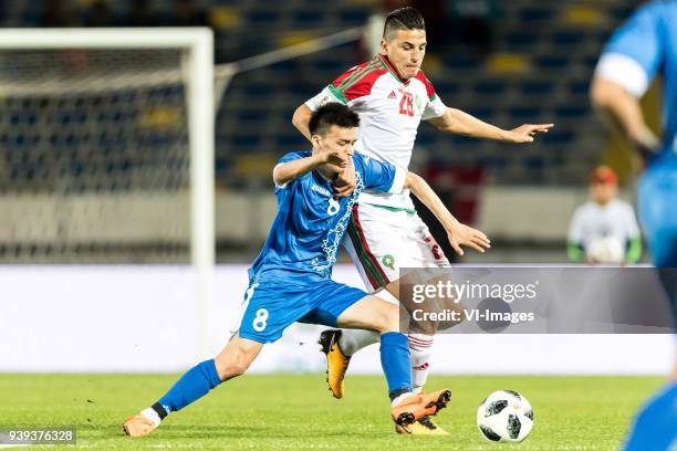 Ikrmjon Aliboev of Uzbekistan, Mohamed Nahiri of Morocco during the international friendly match between Morocco and Uzbekistan at the Stade Mohammed...