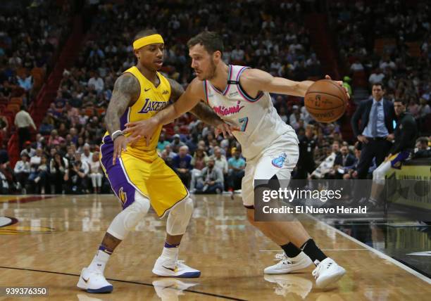 The Miami Heat's Goran Dragic, right, drives against the Los Angeles Lakers' Isaiah Thomas during the first quarter on Thursday, March 1, 2018 at the...