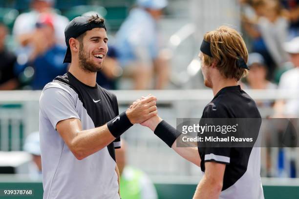 Karen Khachanov and Andrey Rublev of Russia celebrate after defeating Oliver Marach of Austria and Mate Pavic of Croatia during Day 10 of the Miami...