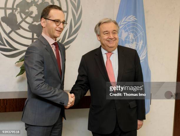 German Foreign Minister Heiko Maas shakes hands with the United Nations Secretary-General Antonio Guterres at the United Nations on March 28, 2018 in...