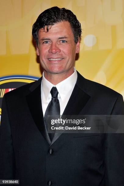 Team owner/NASCAR driver Michael Waltrip poses on the red carpet for the NASCAR Sprint Cup Series awards banquet during the final day of the NASCAR...