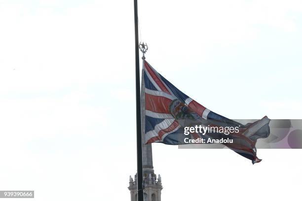 The British Embassy's flag is seen i front of the Soviet Union's emblem star in Moscow, Russia on March 28, 2018. The countries that are to...