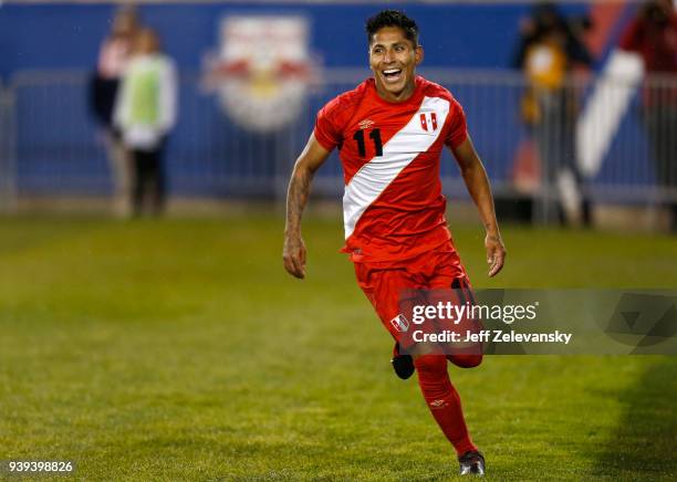 Raul Ruidiaz of Peru celebrates after scoring the second goal of his team against Iceland during an International Friendly match at Red Bull Arena on...