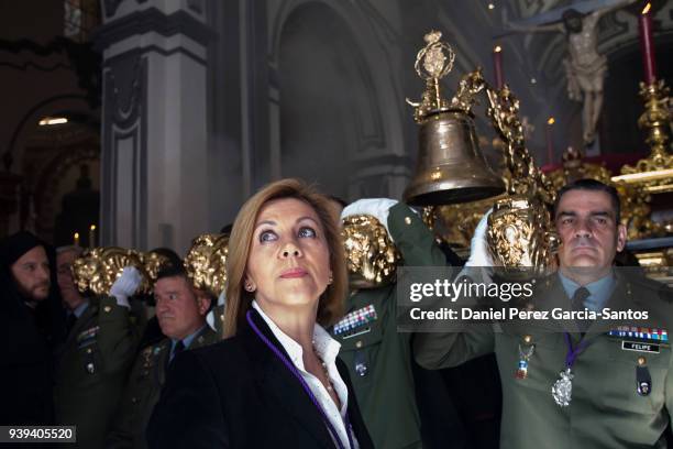 Spanish Defence Minister Maria Dolores de Cospedal take part in the Fusionadas brotherhood procession during Holy Week on on March 28, 2018 in...