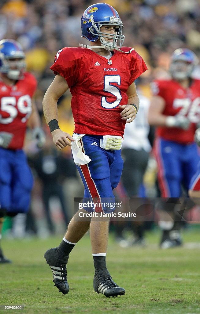 Dirk Reesing Quarterback Todd Reesing of the Kansas Jayhawks jogs on the field ...