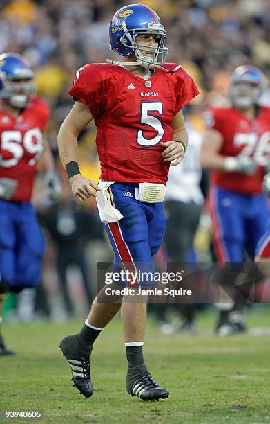 Todd Reesing Dimensional Quarterback Todd Reesing of the Kansas Jayhawks jogs on the field ...