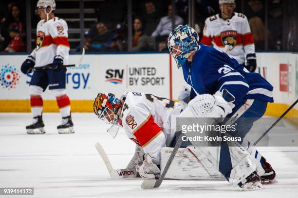 James Reimer of the Florida Panthers and Frederik Andersen of the Toronto Maple Leafs warm up before the Leafs face the Panthers at the Air Canada...