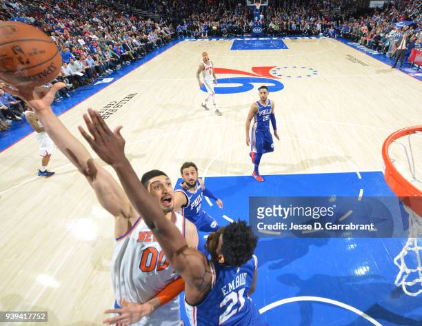 Enes Kanter of the New York Knicks puts up the shot against the Philadelphia 76ers at Wells Fargo Center on March 28, 2018 in Philadelphia,...
