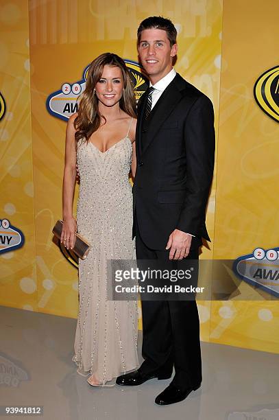 Driver Denny Hamlin and girlfriend Jordan Fish pose on the red carpet for the NASCAR Sprint Cup Series awards banquet during the final day of the...