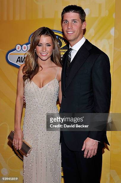 Driver Denny Hamlin and girlfriend Jordan Fish pose on the red carpet for the NASCAR Sprint Cup Series awards banquet during the final day of the...