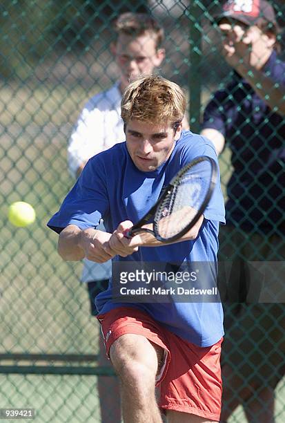 Arnaud Clement hits a backhand during a warm up for the French Davis Cup team, in its first practice session for the Davis Cup Final at the Kooyong...