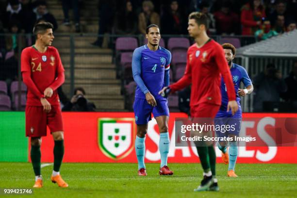 Joao Cancelo of Portugal, Virgil of Dijk of Holland, Cristiano Ronaldo of Portugal, Tonny Vilhena of Holland during the International Friendly match...